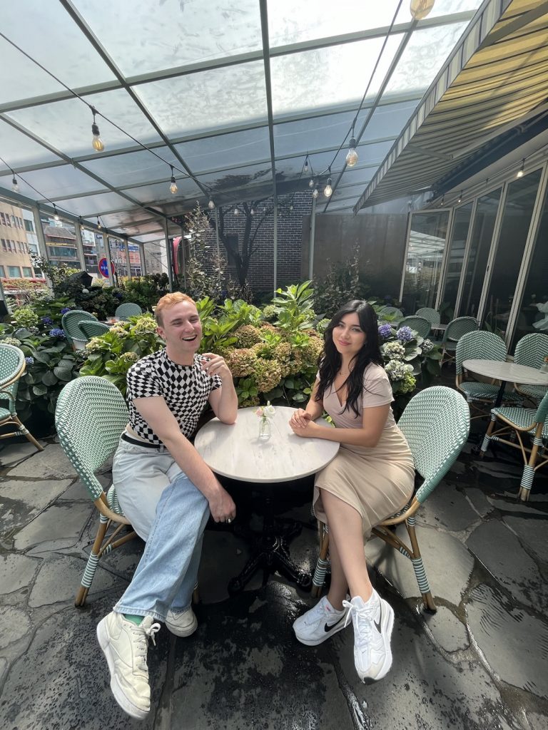 A couple of native English language teachers sitting at a cafe in Korea.