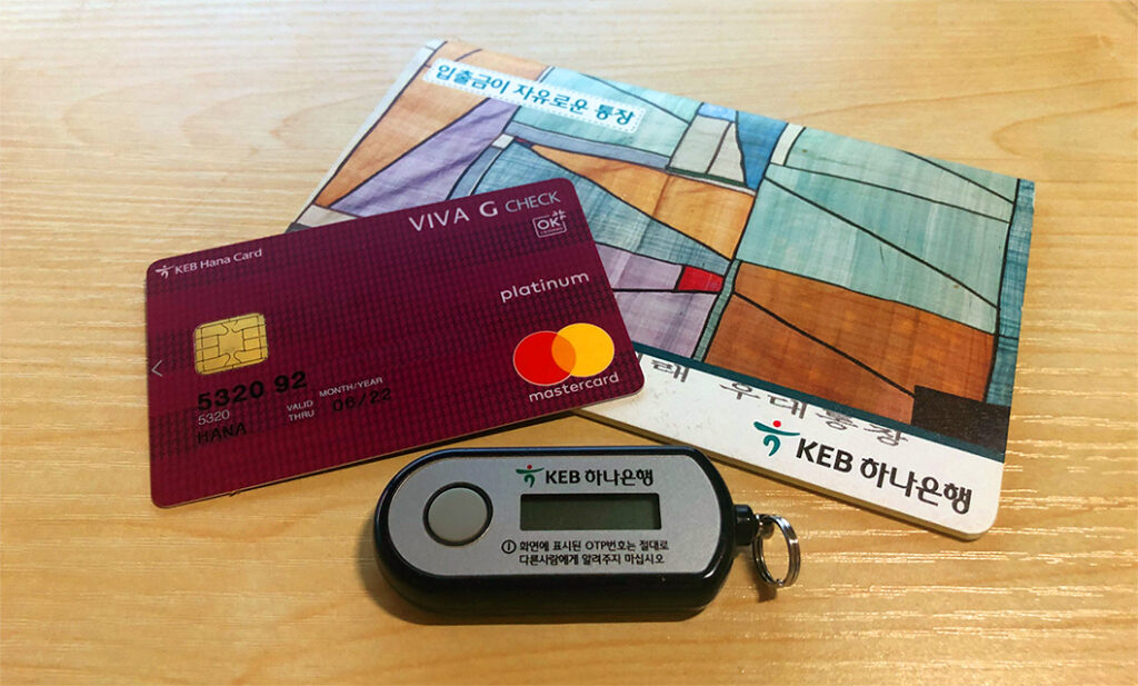 A bankbook, check card, and OTP password device from KEB bank in south Korea