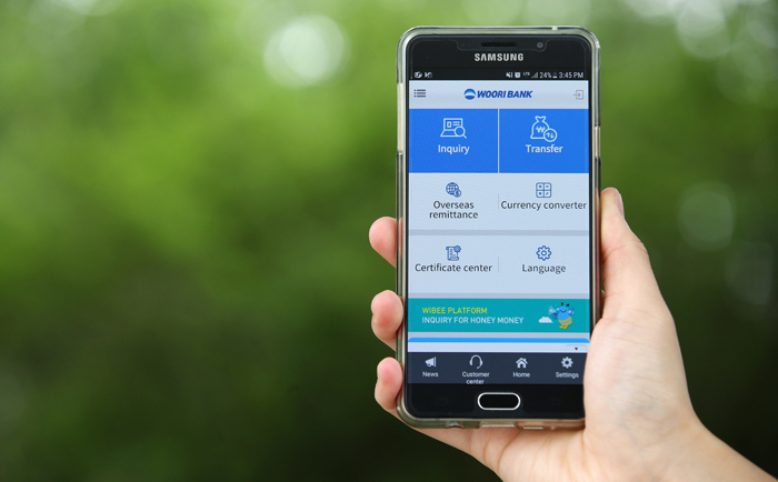 Cell phone showing banking app of Wooribank in Korea